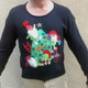 Illustration for article titled 8 Awesome* Teched-Out Christmas Sweaters